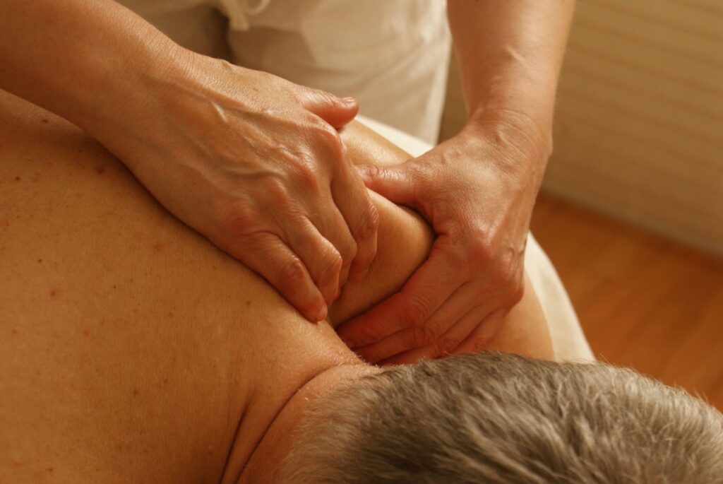 Professional therapist performing a body to body massage in Gulshan 2
